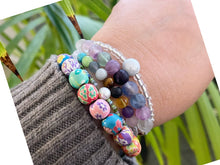 Load image into Gallery viewer, Stacking Bracelet with Central Magic, Illusion bead, hugged by beautiful silver lined glass beads, Great gift for her