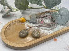 Load image into Gallery viewer, CUSTOMISE YOUR Hand Engraved Beach Pebble Necklace – Ethically Sourced Coastal Jewellery with Natural Beach Stones and Pearl for a Boho Summer Look (Copy)