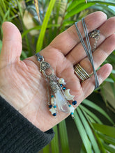 Load image into Gallery viewer, . Quartz Crystal Charm Necklace with Mother Of Pearl Moon and Stars, featuring little pearls on a double cotton cord with extender chain