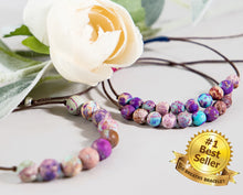 Load image into Gallery viewer, Ten of the most beautiful Imperial Jasper stones. Mixed marble type effect in rich purples, pinks, browns and turquoise blues. Truly a beautiful stone and a Breathe Best Seller.