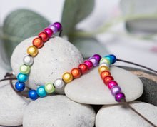 Load image into Gallery viewer, Pride, 10 Breaths Bracelet, Breathe Bracelet. Rainbow Illusion Magic Bead Bracelet