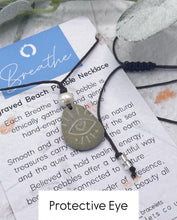 Load image into Gallery viewer, Hand Engraved Beach Pebble Necklace – Ethically Sourced Coastal Jewellery with Natural Beach Stones and Pearl for a Boho Summer Look
