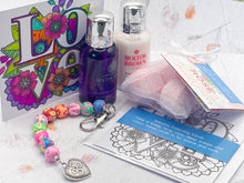 Load image into Gallery viewer, Mother&#39;s Day Care Gift, Floral Bead, Bag or Key Charm Gift pack with Heart Charm,  with Colouring in card, bath fizzes and other curated goodies
