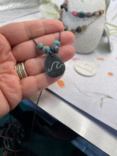 Load image into Gallery viewer, Hand Engraved Beach Pebble Necklace – Ethically Sourced Coastal Jewellery with Natural Beach Stones and Pearl for a Boho Summer Look
