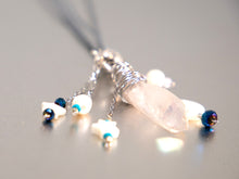 Load image into Gallery viewer, . Quartz Crystal Charm Necklace with Mother Of Pearl Moon and Stars, featuring little pearls on a double cotton cord with extender chain
