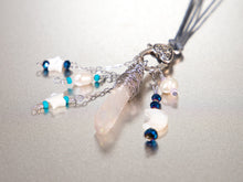 Load image into Gallery viewer, . Quartz Crystal Charm Necklace with Mother Of Pearl Moon and Stars, featuring little pearls on a double cotton cord with extender chain
