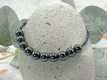 Load image into Gallery viewer, Hematite 10 Breaths Bracelet in a size large
