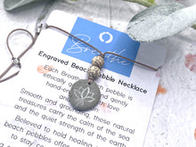 Load image into Gallery viewer, Hand Engraved Beach Pebble Necklace – Ethically Sourced Coastal Jewellery with Natural Beach Stones and Pearl for a Boho Summer Look

