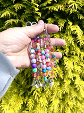 Load and play video in Gallery viewer, Handbag or key charm accessory with cowrie shell and heart charms and floral summer beachy festival beads, unique gift for her, just breathe
