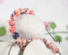 Load image into Gallery viewer, Rain Flower Semi Precious Stone Bracelet in Pinks and Dark Purples for anxiety relief and gentle calming
