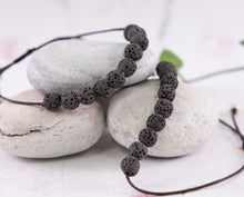 Load image into Gallery viewer, Black LAVA Rock Diffuser Stones Unwaxed, anxiety and stress
