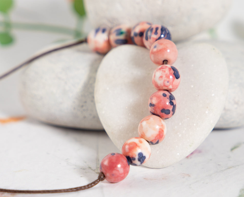 Rain Flower Semi Precious Stone Bracelet in Pinks and Dark Purples for anxiety relief and gentle calming